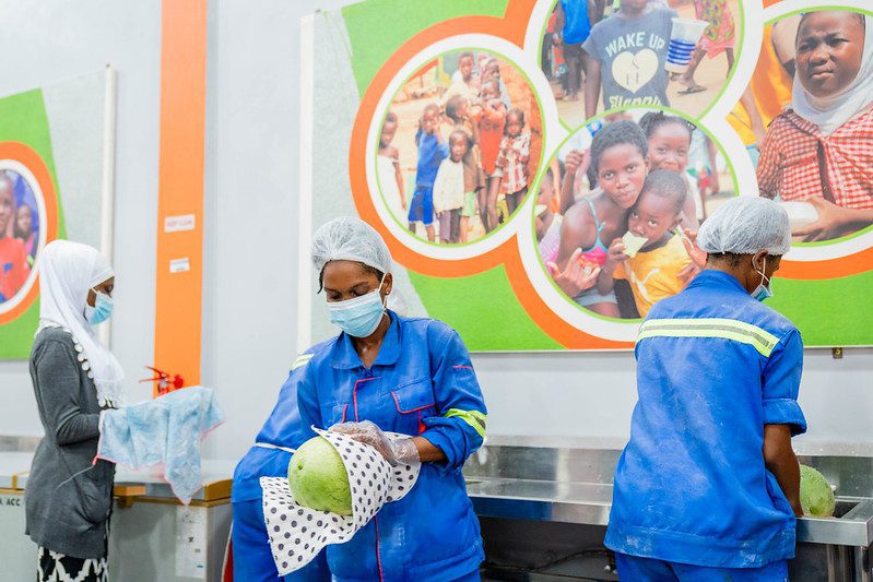 Catherine Nakuader, Sherifa Bunyamin, and Awudza Vera wash, clean, and classify recovered watermelon at Food for All Africa Shai hills warehouse. (Photo: The Global FoodBanking Network/Julius Ogundiran)